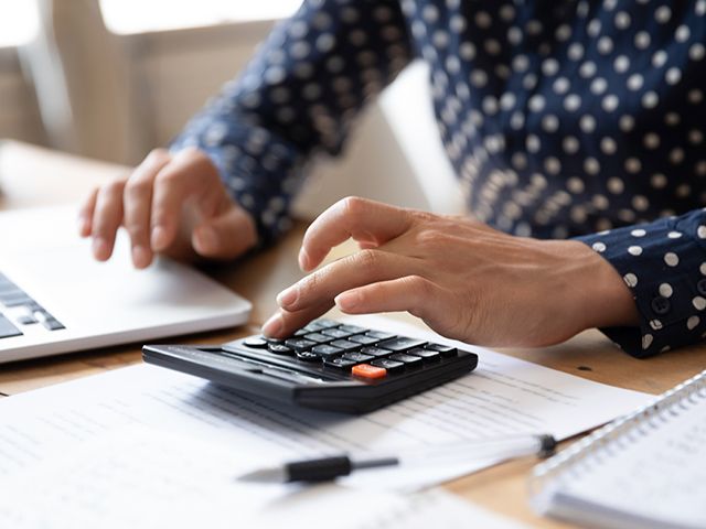 Person using calculator