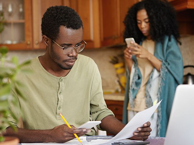 Couple looking at bills
