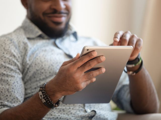 Person reading tablet